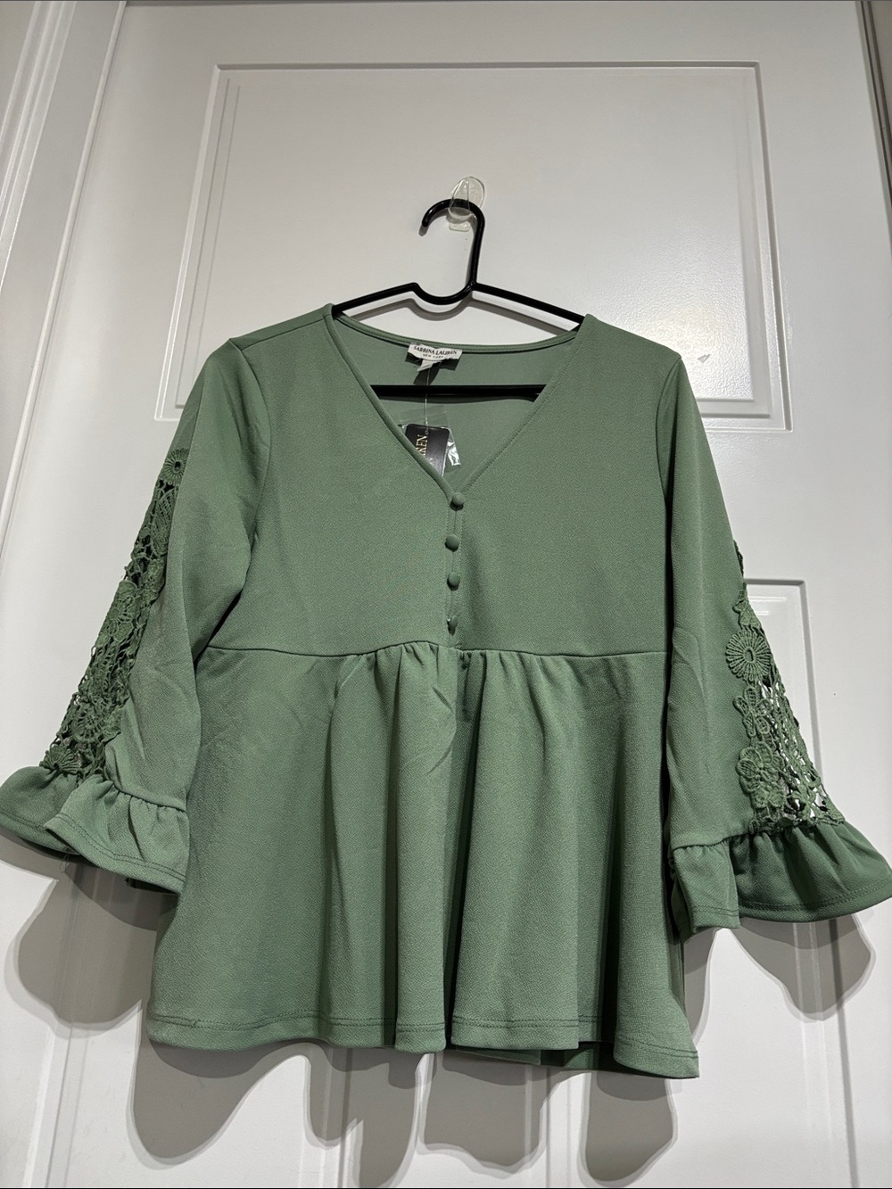 Sabrina Lauren open crochet 3/4 sleeve, V neck, button detail,peblum waist